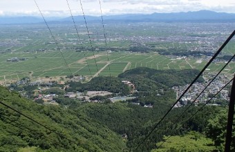 眼下に広がる雄大な越後平野